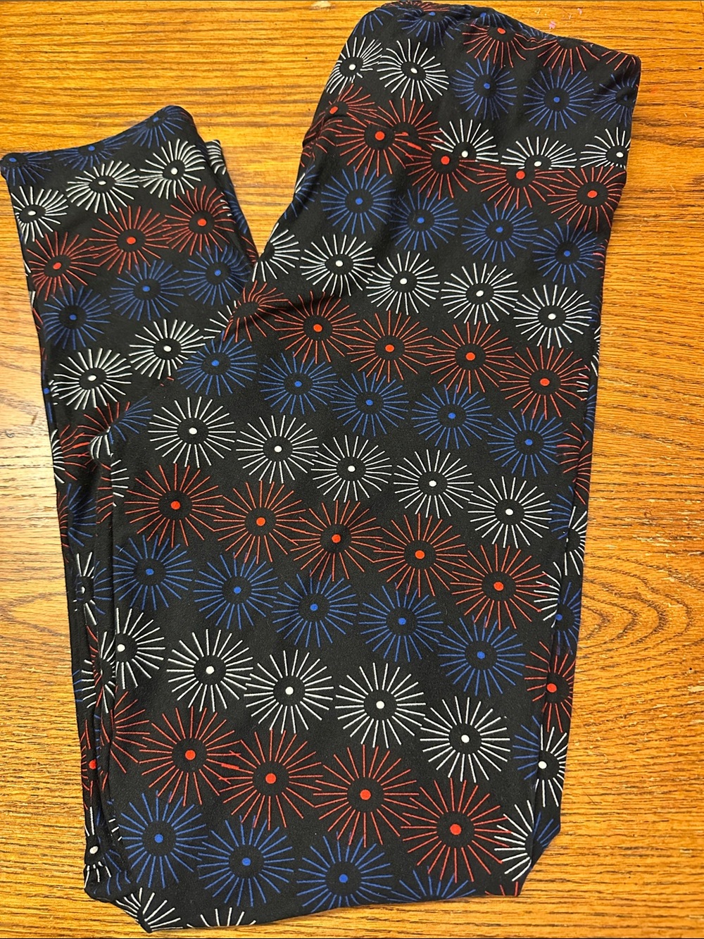 LuLaRoe Black Leggings with Red, Blue & White Starburst Print